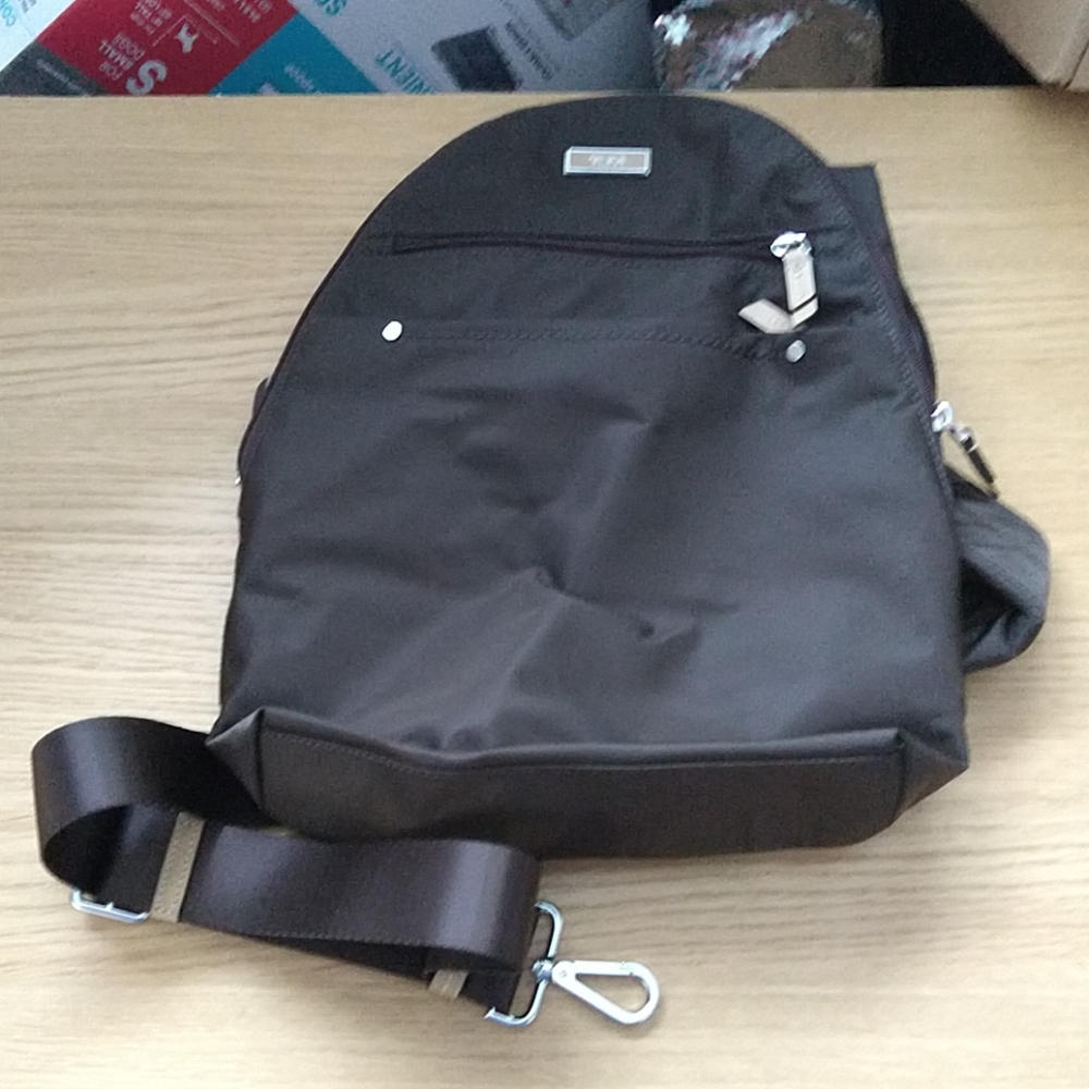 Tumi dark chocolate sling nylon small backpack